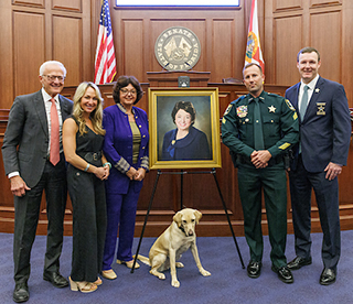 Photo of President Passidomo and her Canine Partner